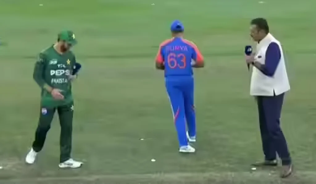 Pakistan vs India toss screengrab from Asia Cup 2025 Super 4s match in Dubai, showing captains before the start of IND vs PAK game.