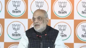 West Bengal mein Kolkata press conference ke dauran Amit Shah BJP sarkar ke vikas aur ghuspeth khatm karne ka wada karte hue